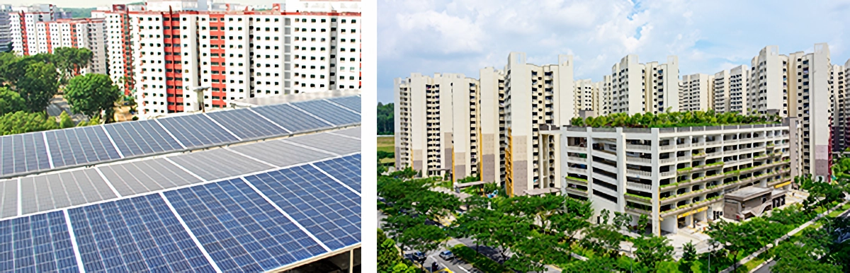 Solar panels on a rooftop with residential tower blocks behind, beside a view of tall apartment buildings with green trees.